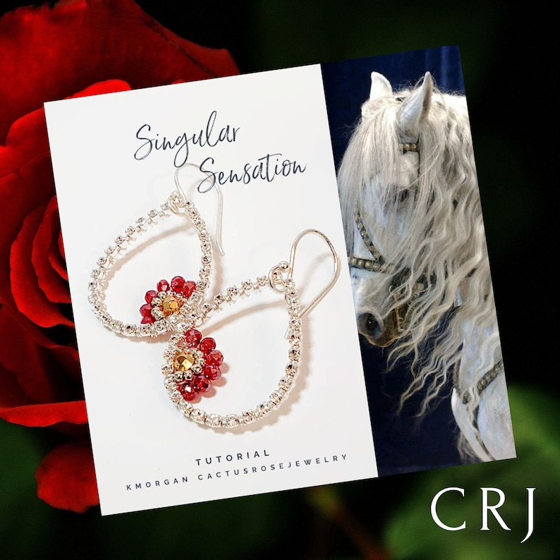 May include: Silver teardrop earrings with red and gold bead accents. The earrings are displayed on a white card with the text "Singular Sensation" and "KMORGAN CACTUSROSEJEWELRY TUTORIAL".