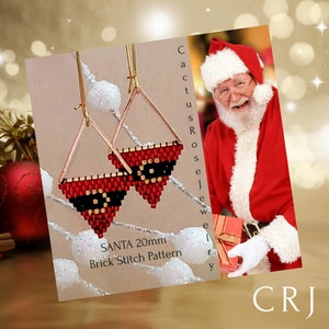 May include: A pair of red and black beaded earrings in the shape of a triangle. The earrings are 20mm in size and are made with a brick stitch pattern. The earrings are hanging from gold-colored hoops. The text "SANTA 20mm Brick Stitch Pattern" is written below the earrings.