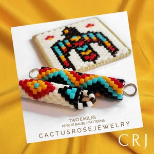 May include: Close-up of beaded jewelry with a Native American design. The image features two beaded baubles and a square pendant with a bird design. The baubles are cylindrical and feature red, yellow, black, and turquoise beads. The pendant has a white background with a bird design.