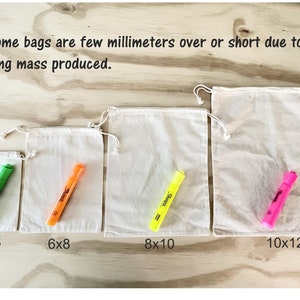 May include: Four white cotton drawstring bags of different sizes with a highlighter marker in each bag. The bags are labeled with their dimensions: 4x6 inches, 6x8 inches, 8x10 inches, and 10x12 inches. *some bags are few millimeters over or short due to it being mass produced.