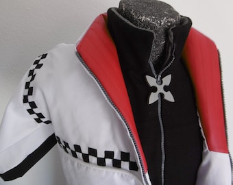 May include: White jacket with black and white checkered trim and a red lining. The jacket has a zipper closure and a silver star-shaped pendant.