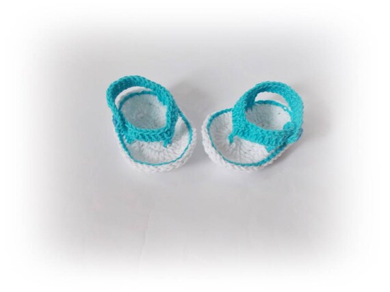 white baby flip flops