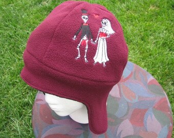 Dia de Los Muertos Skeleton Couple Maroon and Black Fleece Ear Flap Hat