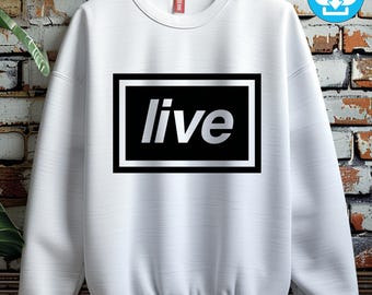 May include: White sweatshirt with the word "live" in silver lettering inside a black rectangle with a white border. The sweatshirt has a crew neck and long sleeves. A digital download icon is in the upper right corner.