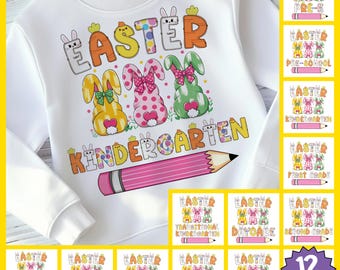May include: A white sweatshirt with a design of Easter bunnies and the text "Easter My Kindergarten". The design is colorful and features a pink pencil.
