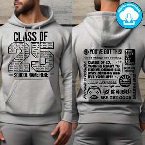 May include: A light gray hoodie with black text. The front reads "CLASS OF 25" with space for a school name. The back features motivational phrases like "YOU'VE GOT THIS!" and "STAY POSITIVE". A digital download icon is in the upper right.