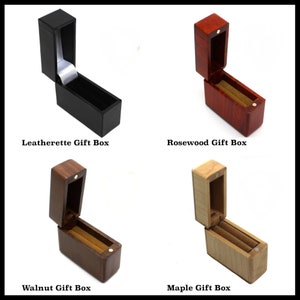 This image shows the 4 Gift Boxes that are available as an upgrade. They are: Black Leatherette, Rosewood, Walnut and Maple.