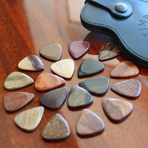 18 Exotic Timber Tones Guitar Picks in a Beautiful Leather Wallet - These picks can be customised with a personal message