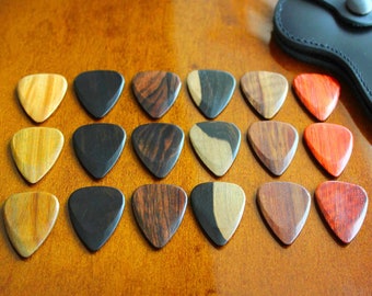 18 Electric Guitar Exotic Timber Tones Picks - Supplied in a Leather Wallet - The picks can be customised with your own personal message.