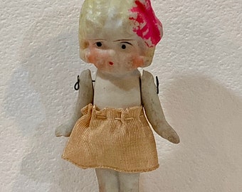 ribbon jointed doll