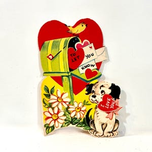 May include: A vintage Valentine's Day card with a red heart, a yellow mailbox, and a puppy holding a heart that says "I Love You." The card also features a yellow bird and white daisies.