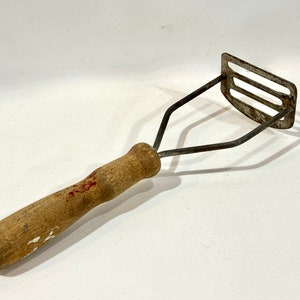 Vintage Potato Masher: Wood Handle Steel Kitchen Utensil, Circa 1940s