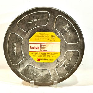 5 3/4 Inch Metal 8mm Film Reel And Metal Storage Canister.