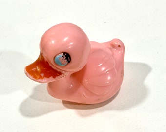 Vintage roze plastic eendrammelaar - Knickerbocker Skipper Toy