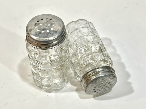 Mid century, glass salt/ pepper shakers, metal top, swirl design