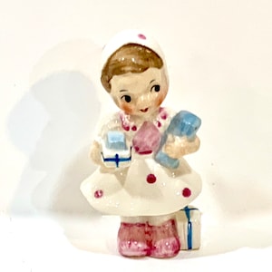 Vintage UCAGCO Ceramic Girl Figurine: Hand-Painted 1950s Collectible