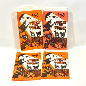 Papieren snoepzakjes voor Halloween uit de jaren 60: vintage ontwerp heks en zwarte kat