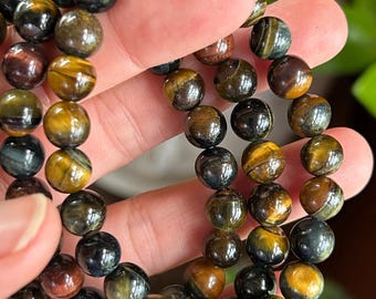 Bracciale elastico con gemma occhio di tigre scura da 8 mm