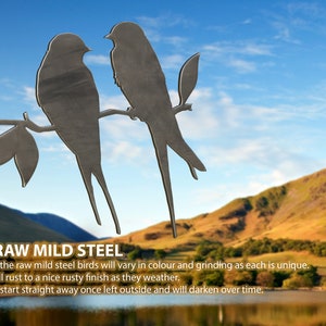 Raw mild steel not yet rusted barn swallows metal bird art for tree or fence posts and more.