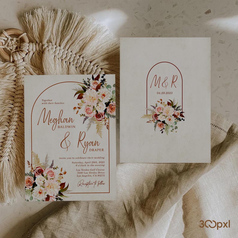 A terracotta boho wedding invitation with matching backside