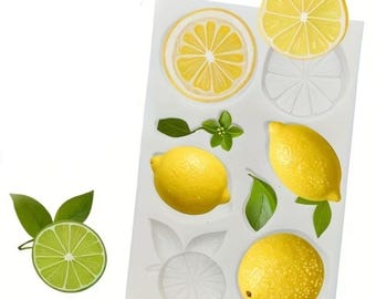 May include: A white silicone mold featuring various lemon and lime shapes, including whole citrus fruits, sliced citrus rounds, and green leaves. The mold contains both raised and recessed cavities for creating detailed citrus-themed craft items.