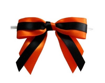 May include: Orange and black satin ribbon bow with a wire loop for attaching to a gift or package.