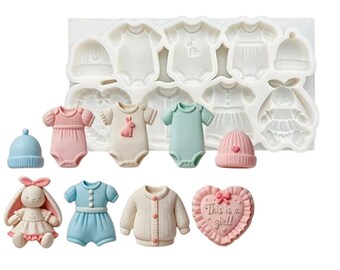 May include: A white silicone mold featuring cavities for baby-themed shapes, including onesies, hats, and a rabbit. Beside the mold are finished figures: a blue hat, a pink onesie, a cream onesie with a rabbit, a teal onesie, a pink hat, a rabbit doll, a blue outfit, a cream cardigan, and a pink heart-shaped plaque with the text "This is a girl!"