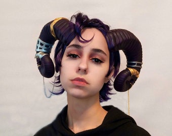 Dark purple Mollymauk Tiefling inspired big ram horns Critical Role character. Cosplay horns