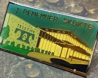 TT Teletype Corporation vintage error pin badge I Remember Skokte