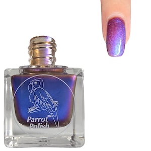 May include: A square glass bottle of nail polish with a metallic purple and blue shift finish. The label features a white line drawing of a parrot on a perch with the text Parrot Polish. A fingernail displays the same iridescent purple and blue polish.