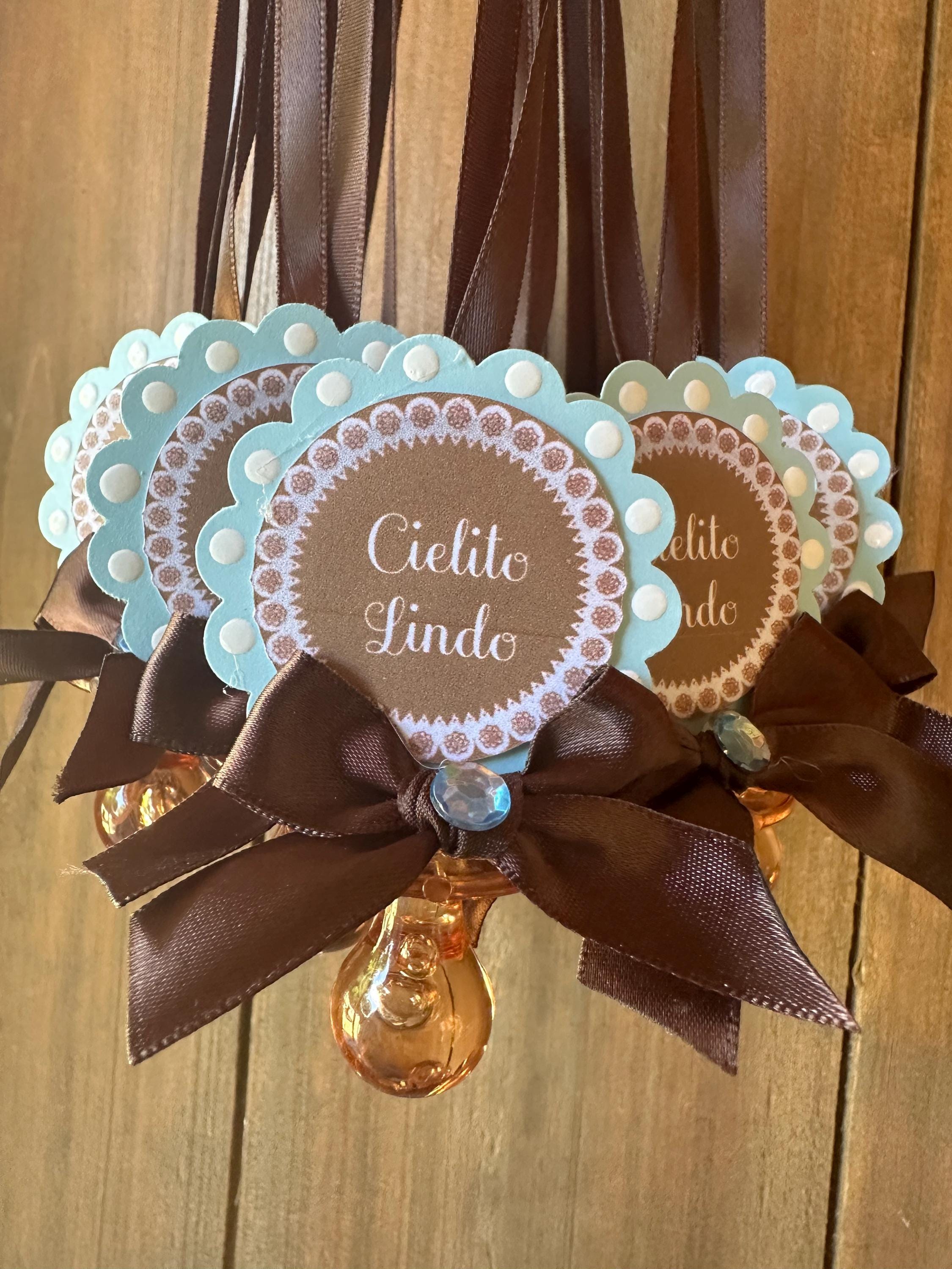 Collares de chupete para baby shower para juego de baby shower - 12 piezas de recuerdos de fiesta Decoraciones Cielito Lindo en color azul claro y marrón es un niño