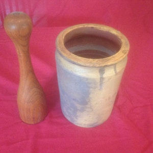 Beautiful colored stoneware crock and pestle