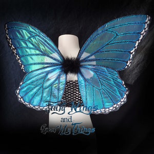 Child sized blue Morpho butterfly inspired iridescent fairy wings w holographic details perfect for flower girls, pageant wear, or Halloween