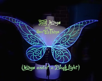 Large Iridescent white Tinkerbell inspired adult sized pixie cosplay fairy wings that glow in the dark and are UV reactive for costume