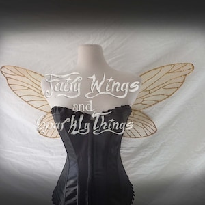 Custom sparkling gold dragonfly adult fairy wings with shimmering holographic glitter detailing perfect for Renaissance made to order