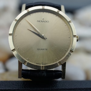 14K Gold Watch Wrist Movado Quartz Vintage Art Deco Genuine Leather Water Resistant 18 R Face Excellent Vintage Condition Gold Dial 32mm