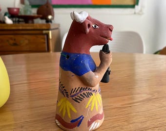 Vintage Terracotta Bull Handbell Holding Saxophone Mexican Folk Art