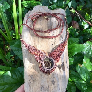 Ammonite Fossil Necklace knotted with Earthy brown toned threads and small brass beads · Handmade Macrame Style