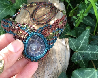 Ammonite Necklace knotted with woodland vibed brown green threads and small brass beads | Macrame Style