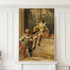 May include: A framed antique painting shows two figures in Renaissance dress, one playing a lute. The artwork is above a white fireplace, with emerald green velvet armchairs with gold bases, and a glass coffee table.