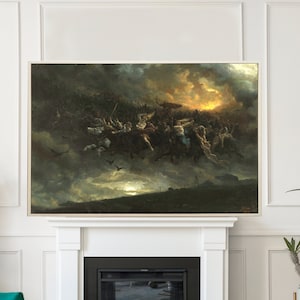 May include: A large framed artwork showing a dramatic battle scene with figures and horses against a fiery sky. The painting hangs above a white fireplace in a modern living room. The room includes teal armchairs, a glass coffee table, and potted plants.