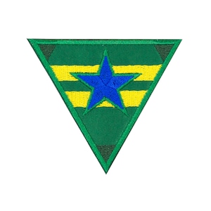 May include: Green triangle patch with a yellow and blue star in the center.