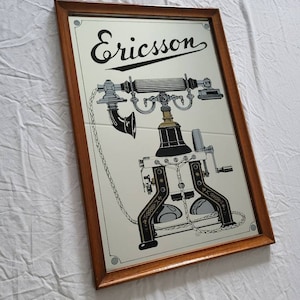 Ericsson vintage mirror with old fashioned telephone