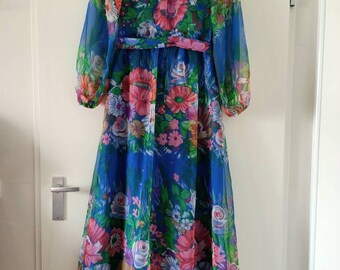 Blauw gebloemde doorschijnende seventies jurk