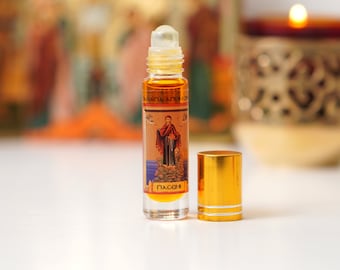 Olio per unzione con oli essenziali (profumo di gelsomino o di rosa selvatica) in roll-on – da Tinos, l'isola sacra, dono di fede e speranza.