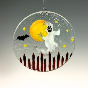 Halloween-zonnevanger, gesmolten glas, spookraam hangend