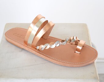 Women's toe ring sandals with straps in rose gold color from Genuine leather