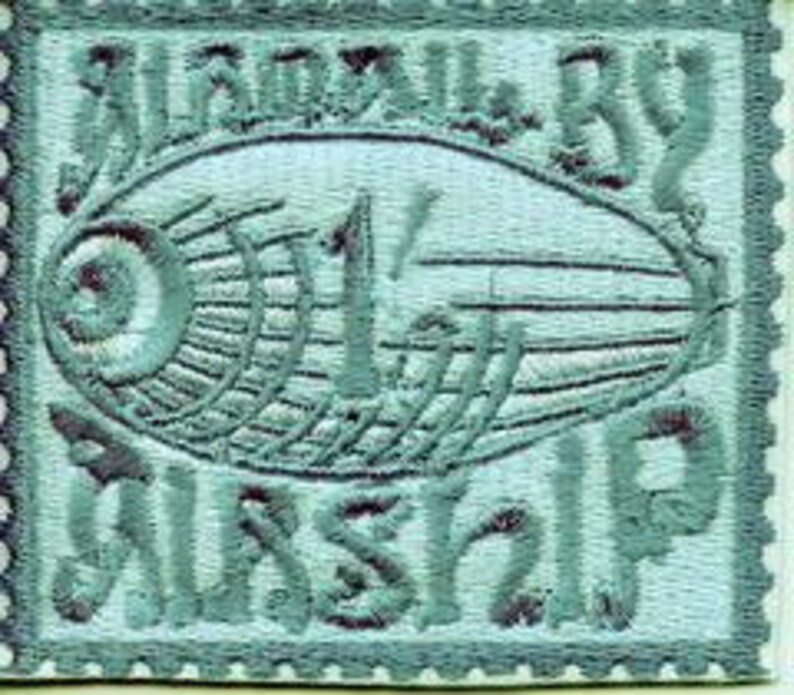 May include: A blue embroidered patch with the words "Blood & Guts" above a stylised image of a ship and the words "Bus Stop" below.