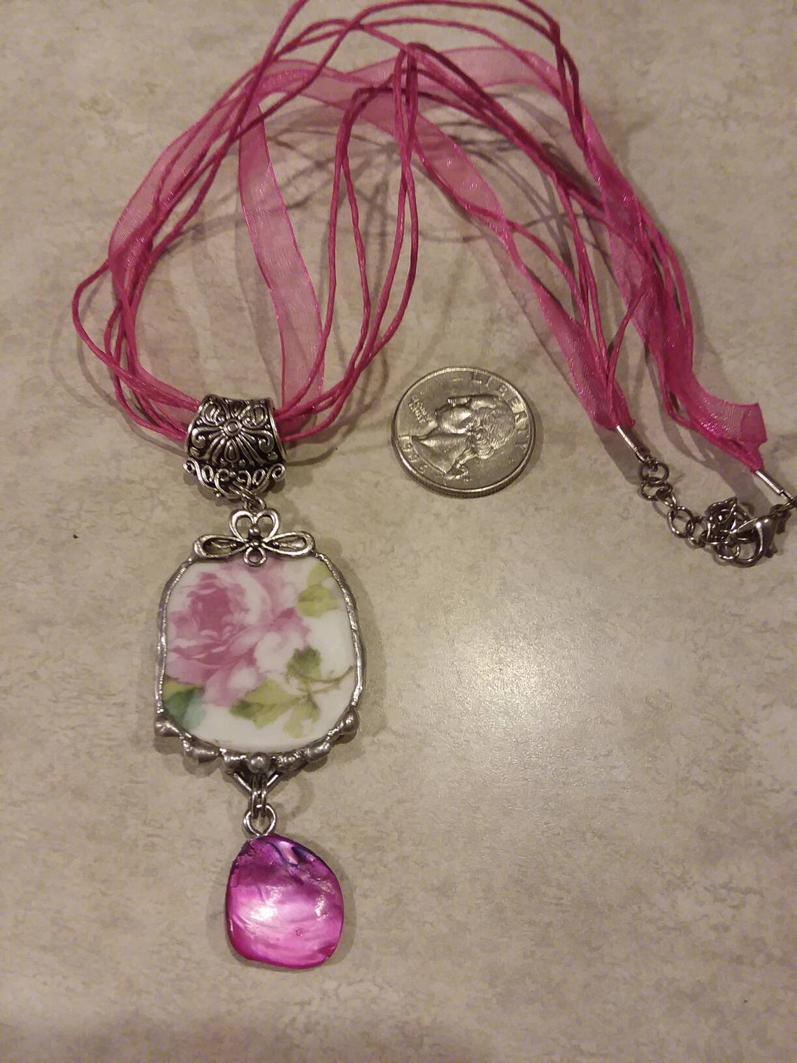 Handmade pendant on a cord and ribbon necklace made from a Etsy