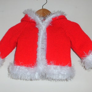 Hand knitted fur trimmed hooded coat image 1